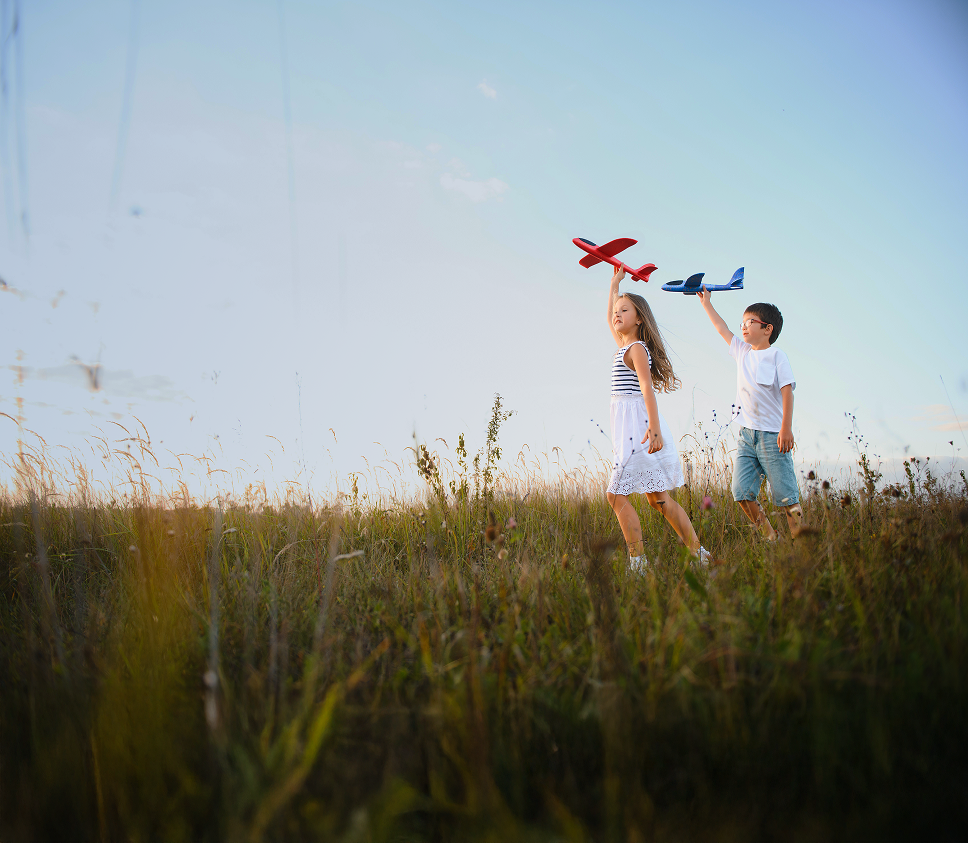 Children running in a field